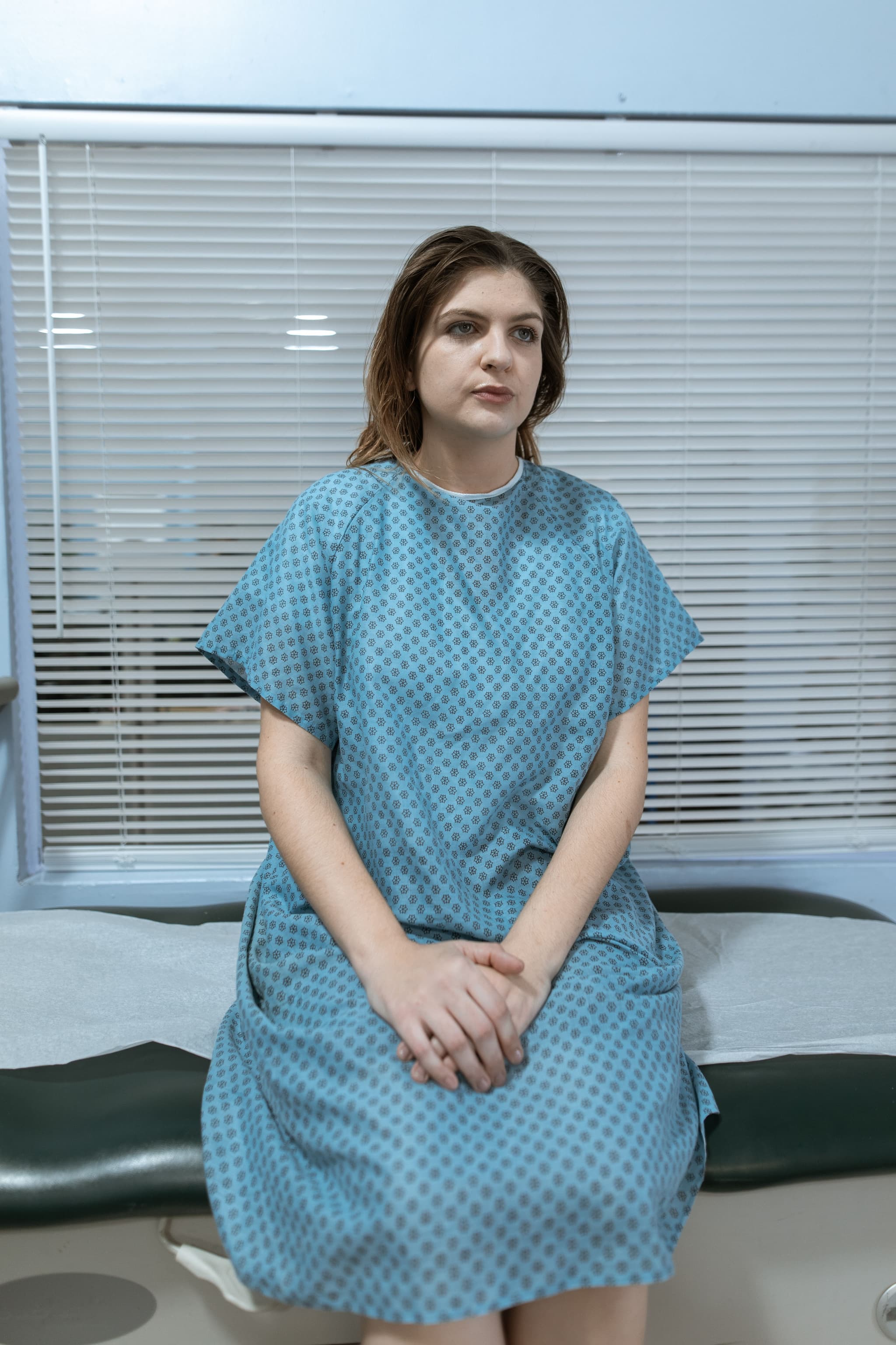 A patient gown styled in a clinical setting