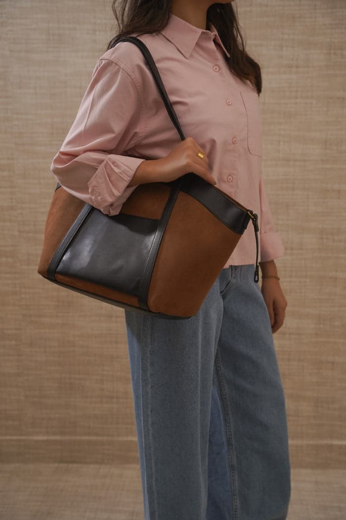 Tan and black shoulder tote