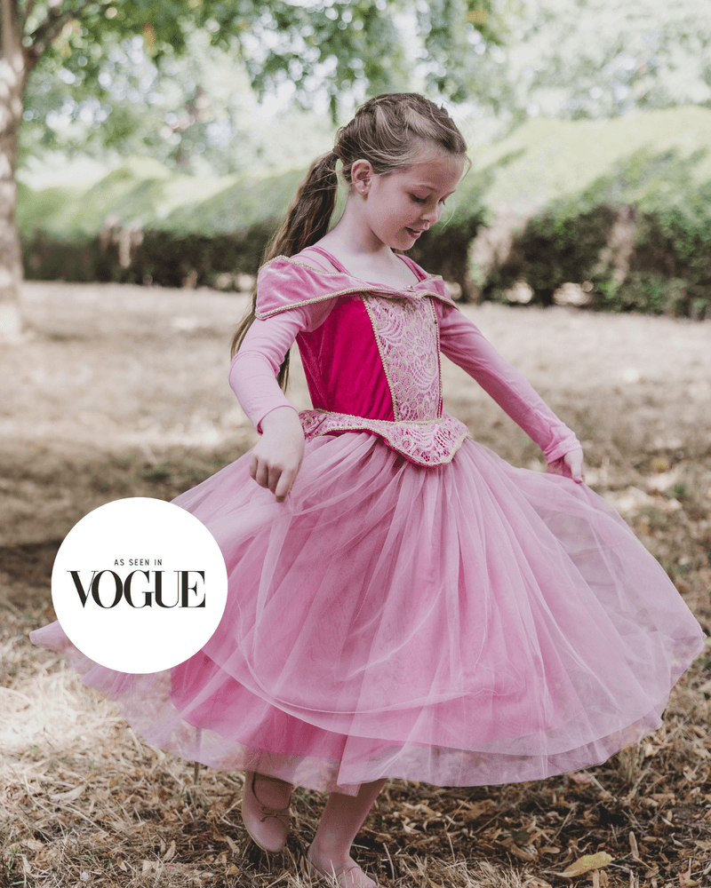 A girl in a soft occasion dress