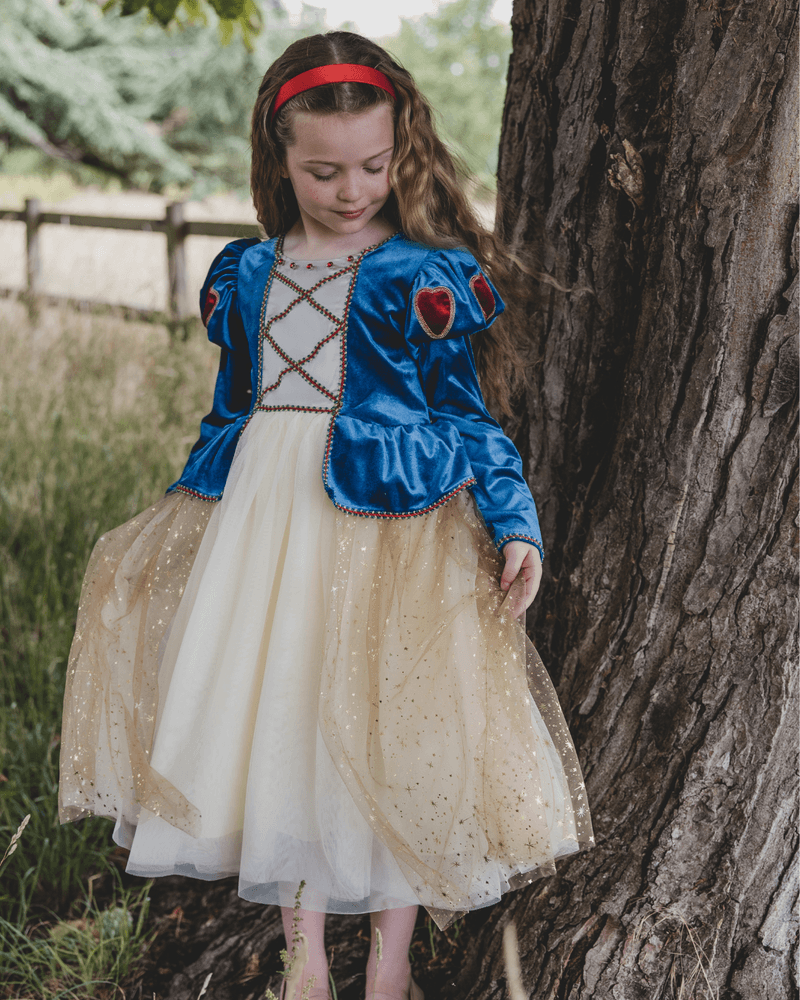 A girl in a soft occasion dress