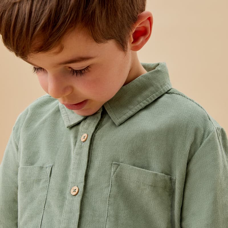 A boy in a sage corduroy shacket