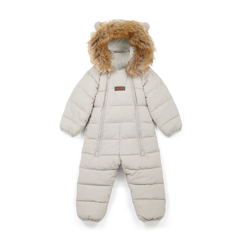A winter-white quilted baby onesie with faux-fur hood