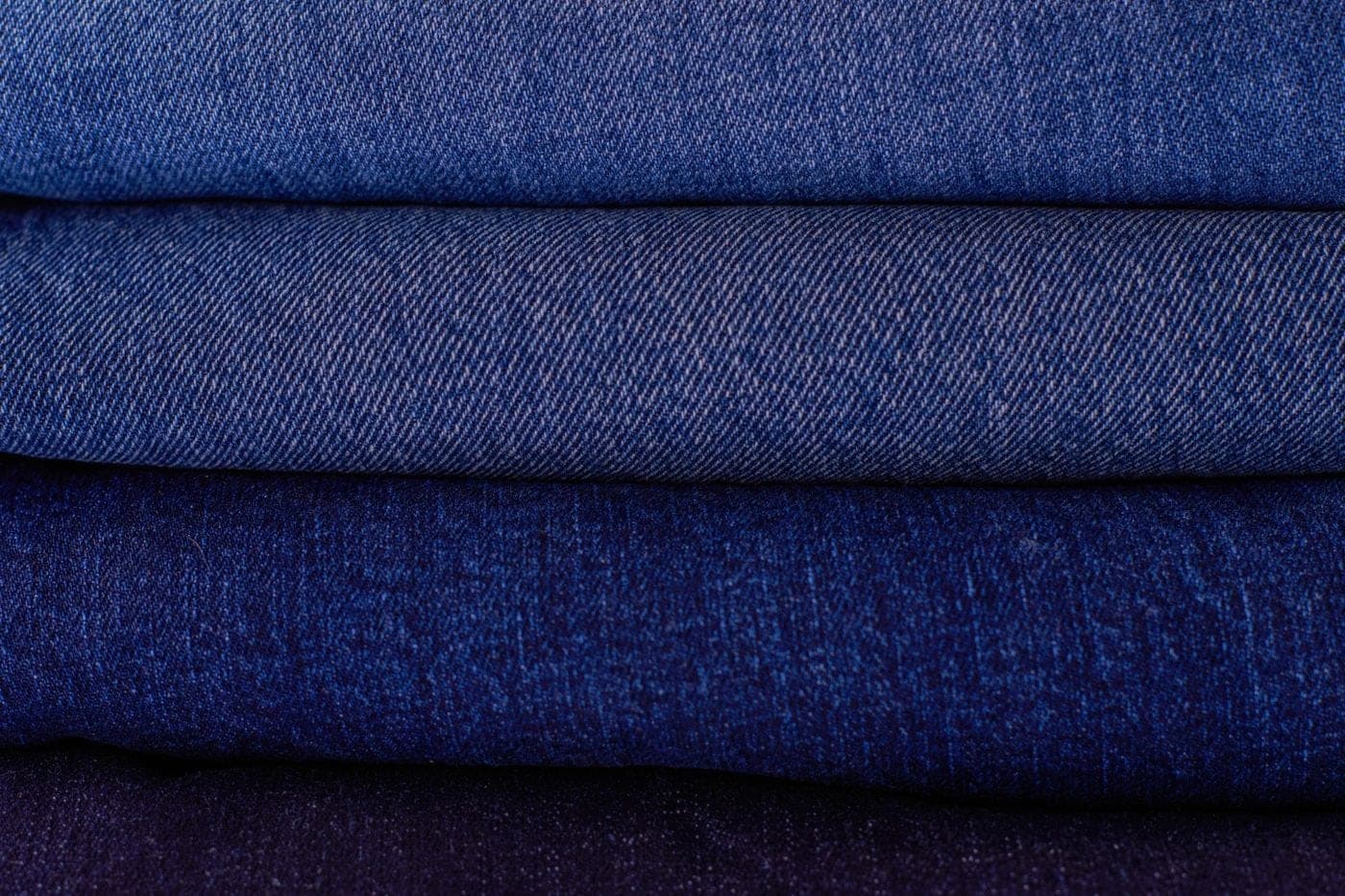 A stack of folded indigo denim
