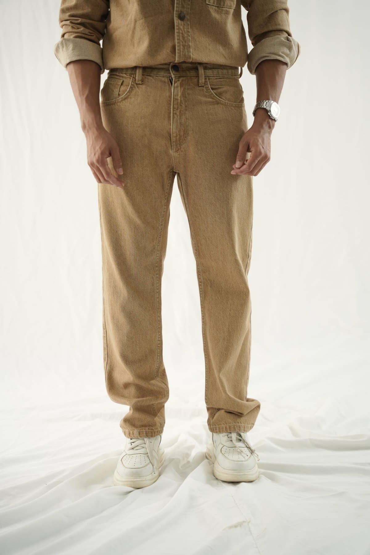 Light khaki denim jeans on a male model