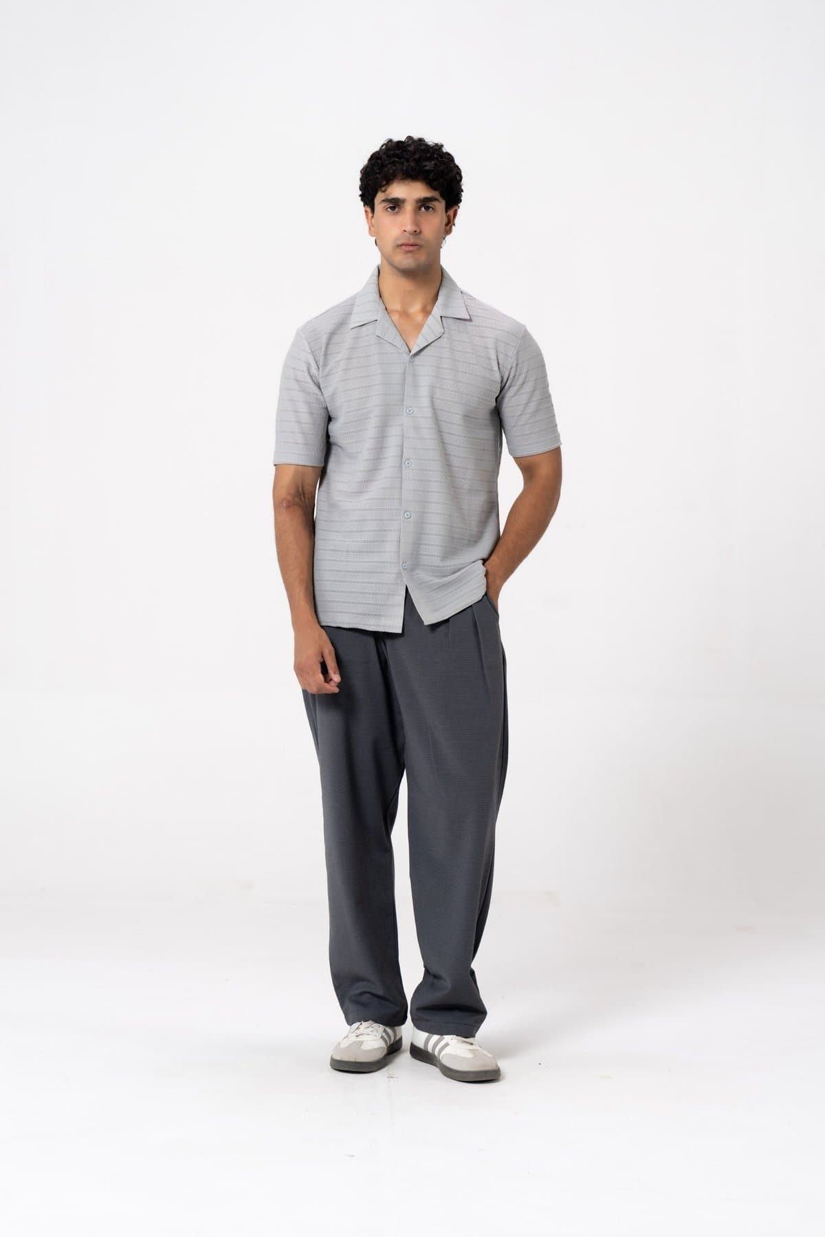Male model in a grey textured woven shirt