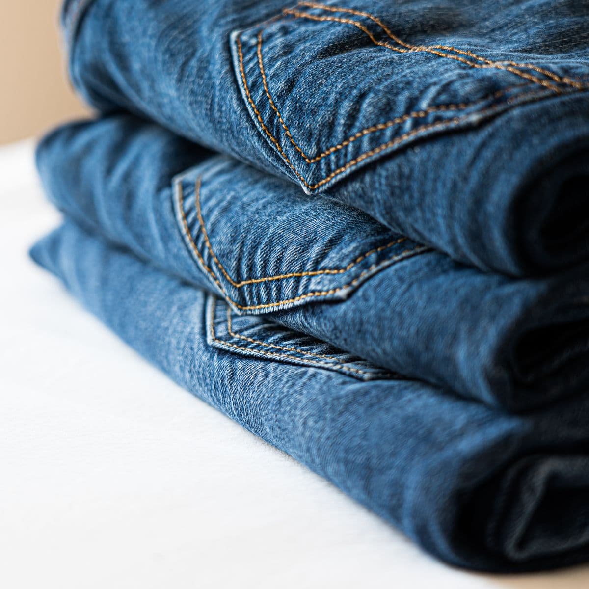 A stack of folded indigo jeans