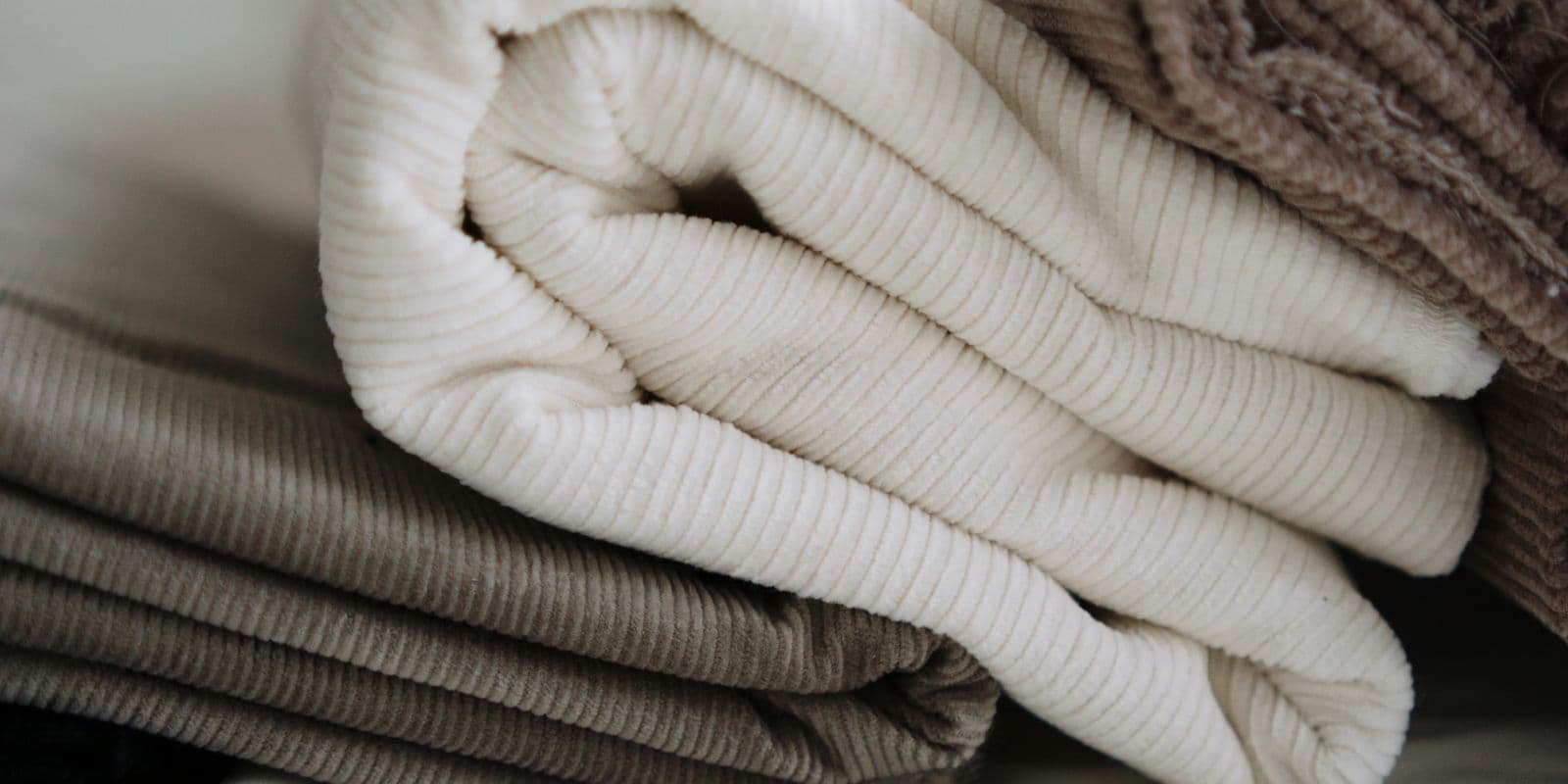Soft ivory and taupe corduroy fabric
