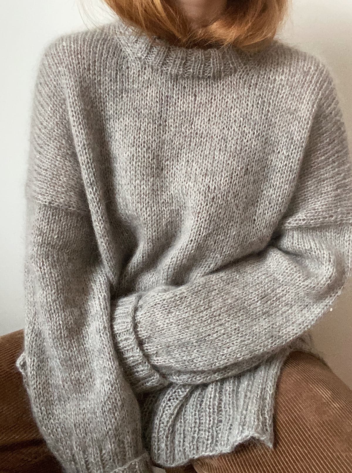 Soft knitted sweater in natural yarn
