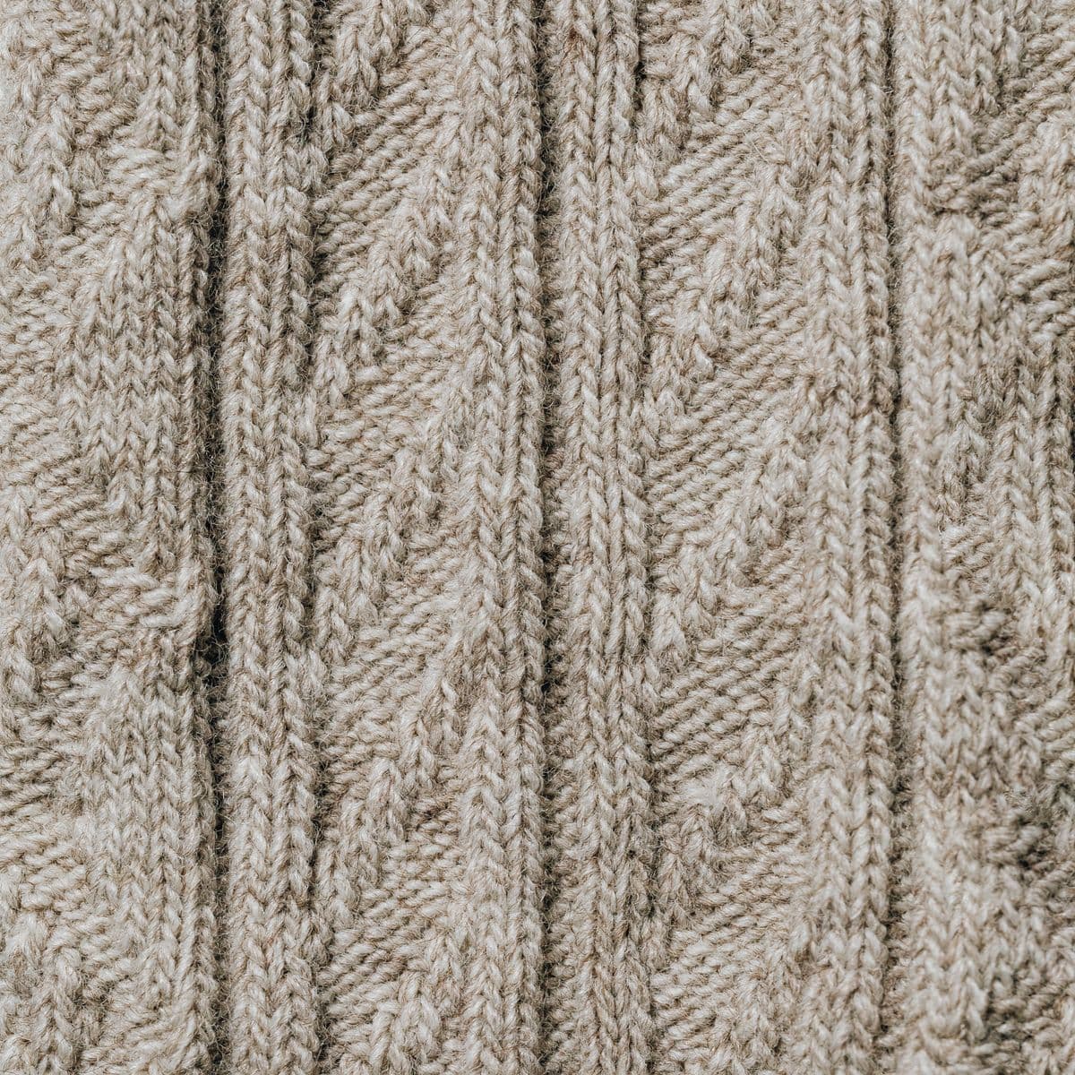 Beige ribbed knit fabric texture