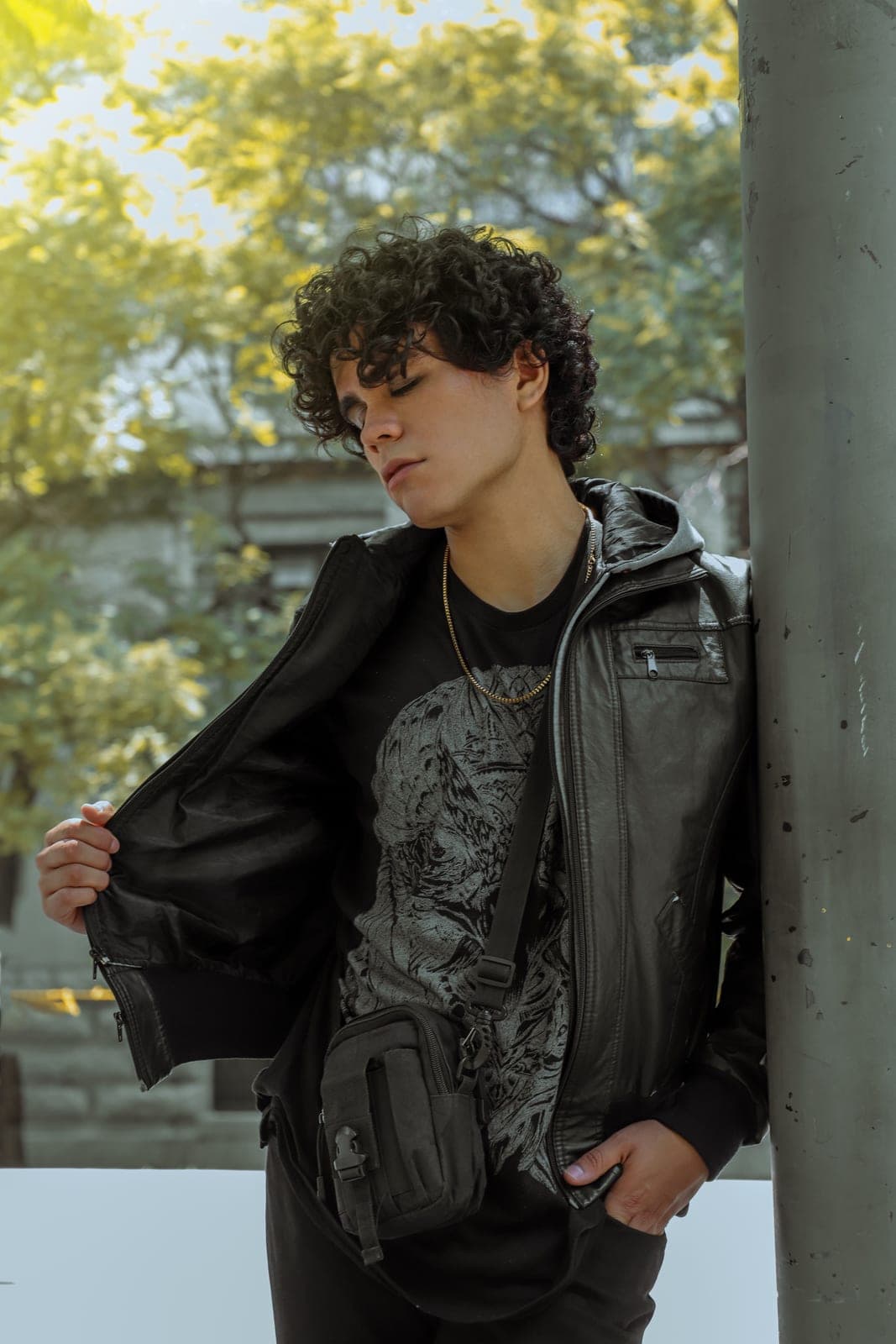A man in a black leather jacket