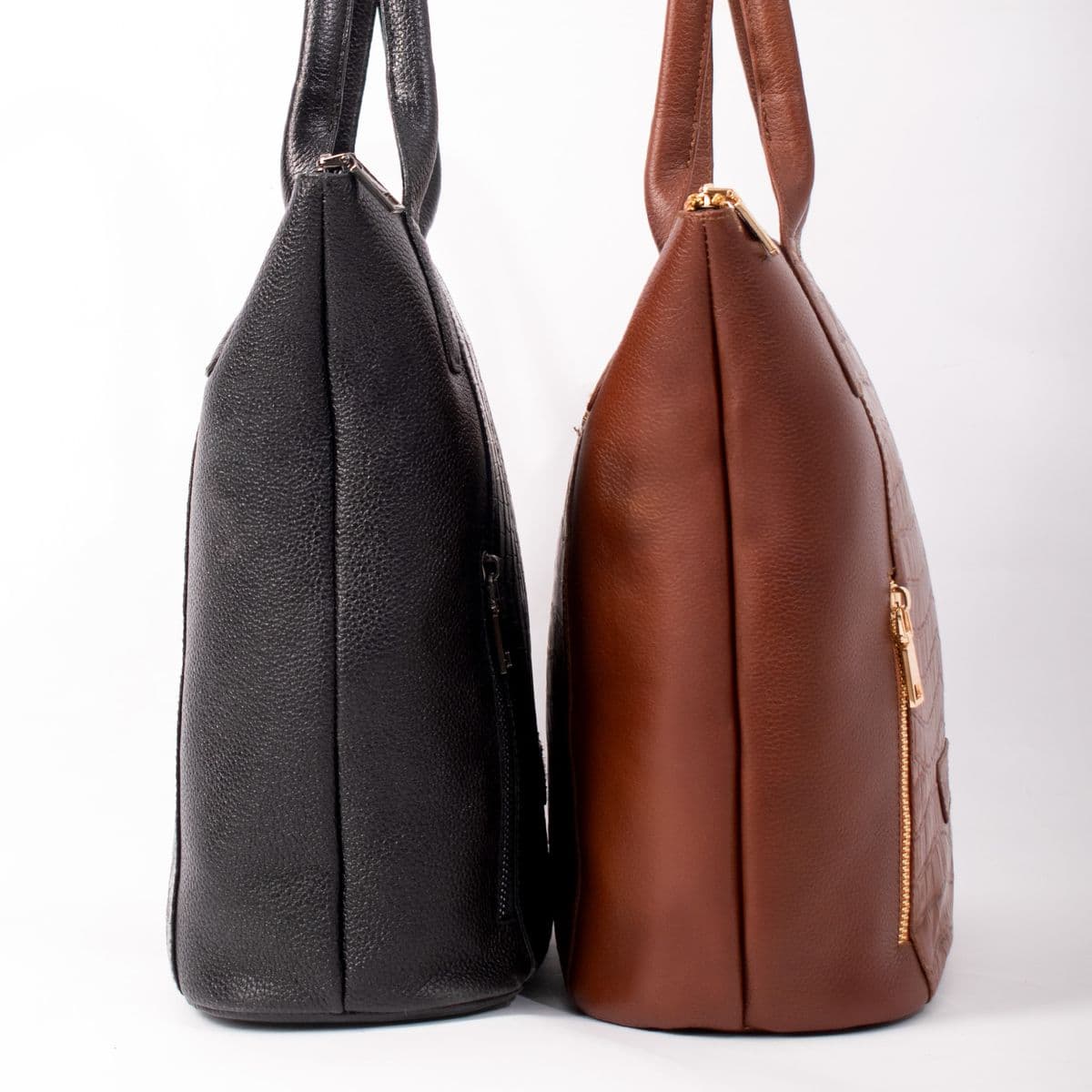 Black and cognac leather tote bags