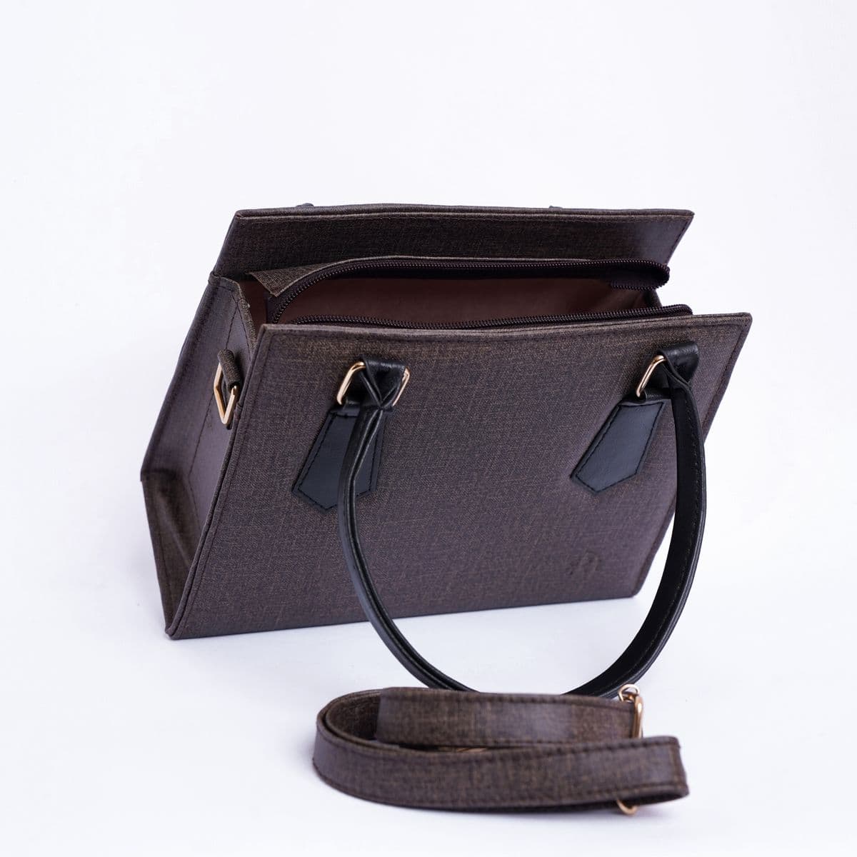 A dark brown leather handbag with strap