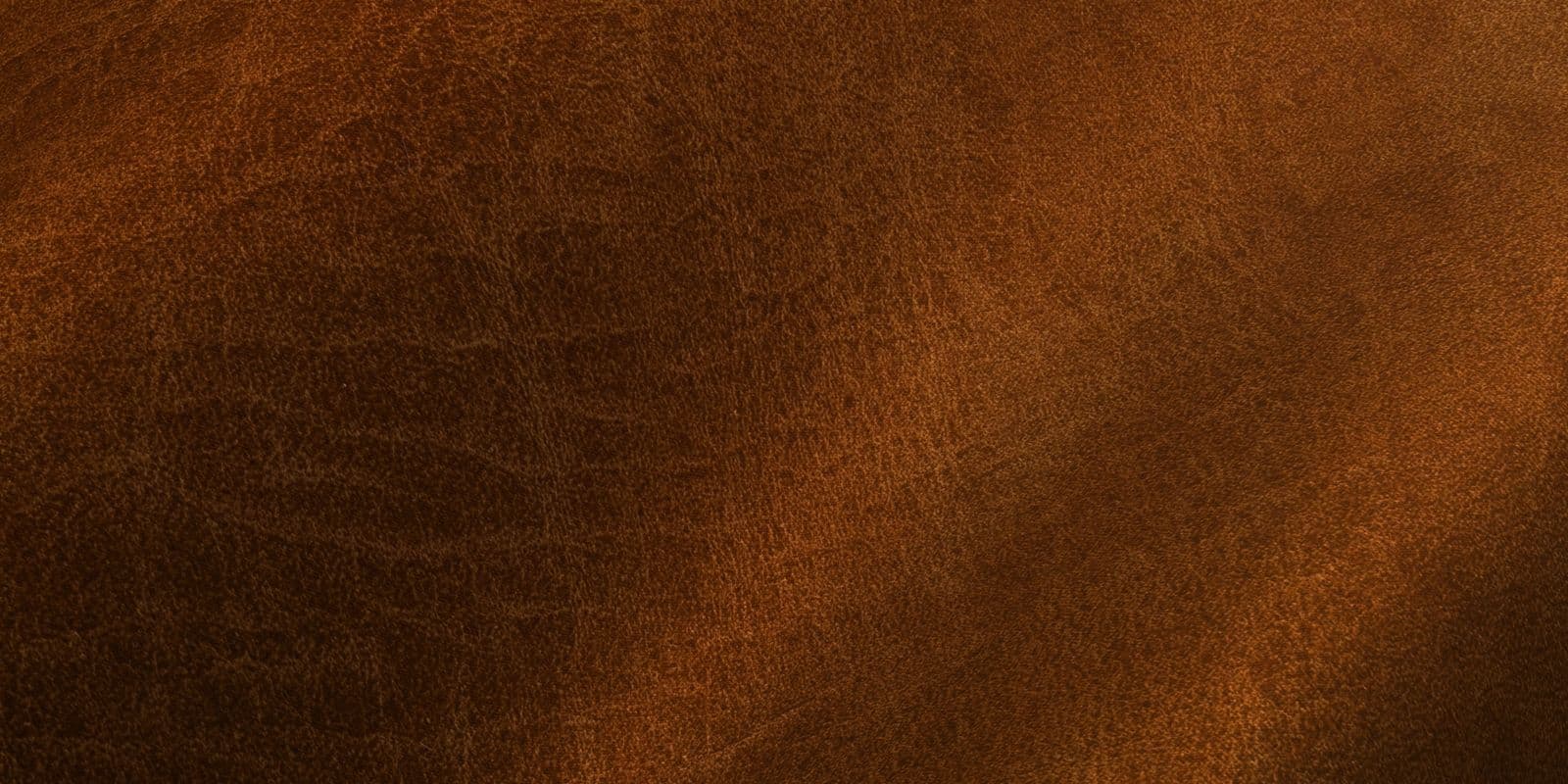 Rich cognac-brown leather grain in close detail