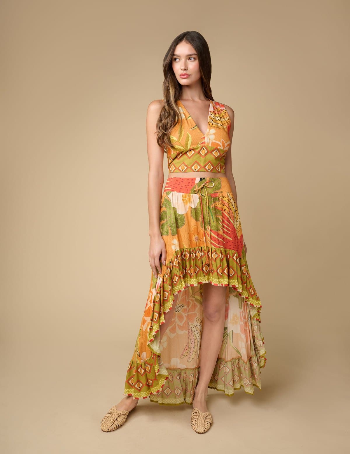 Model in a floral hi-lo maxi dress