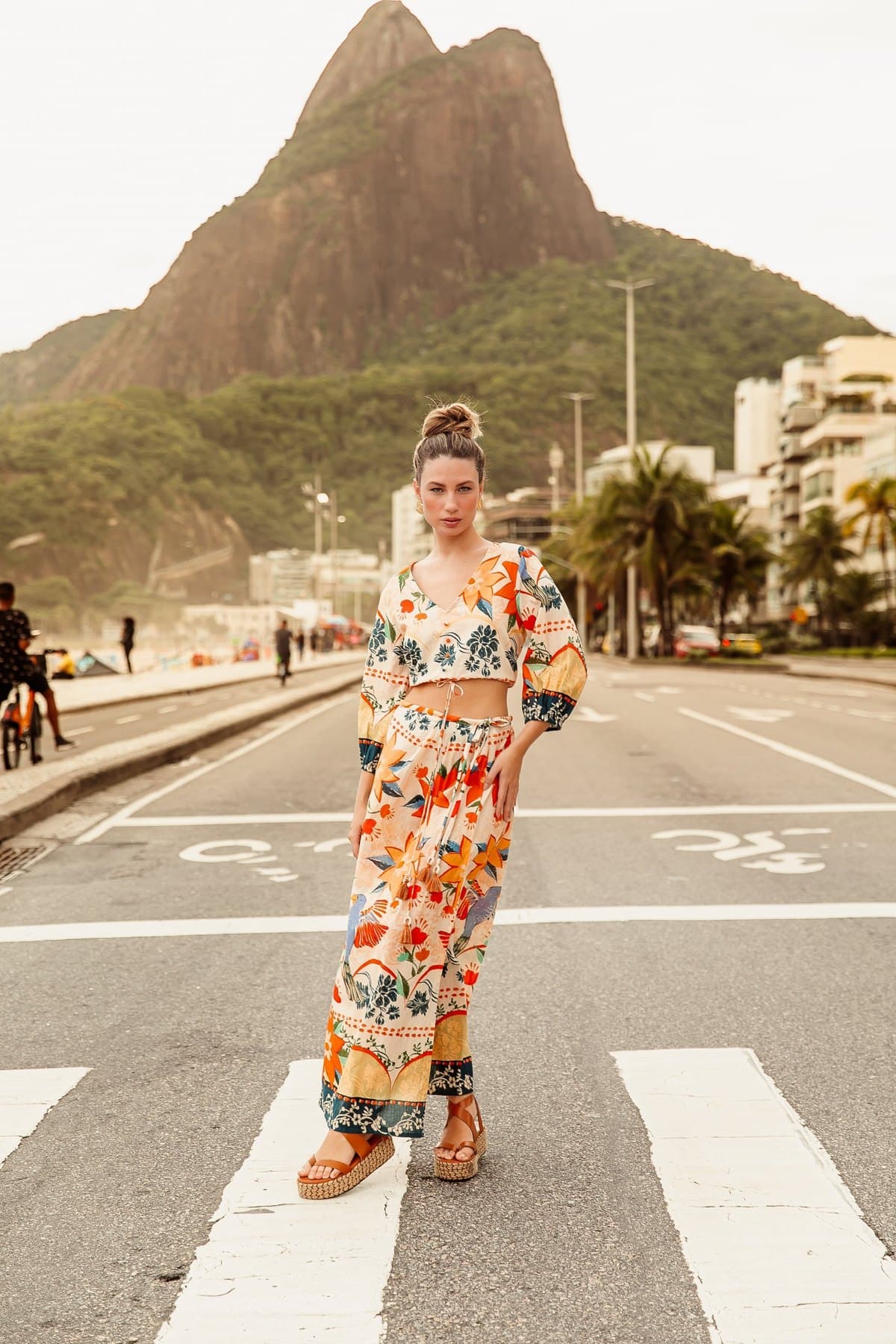 Model in a floral co-ord maxi set