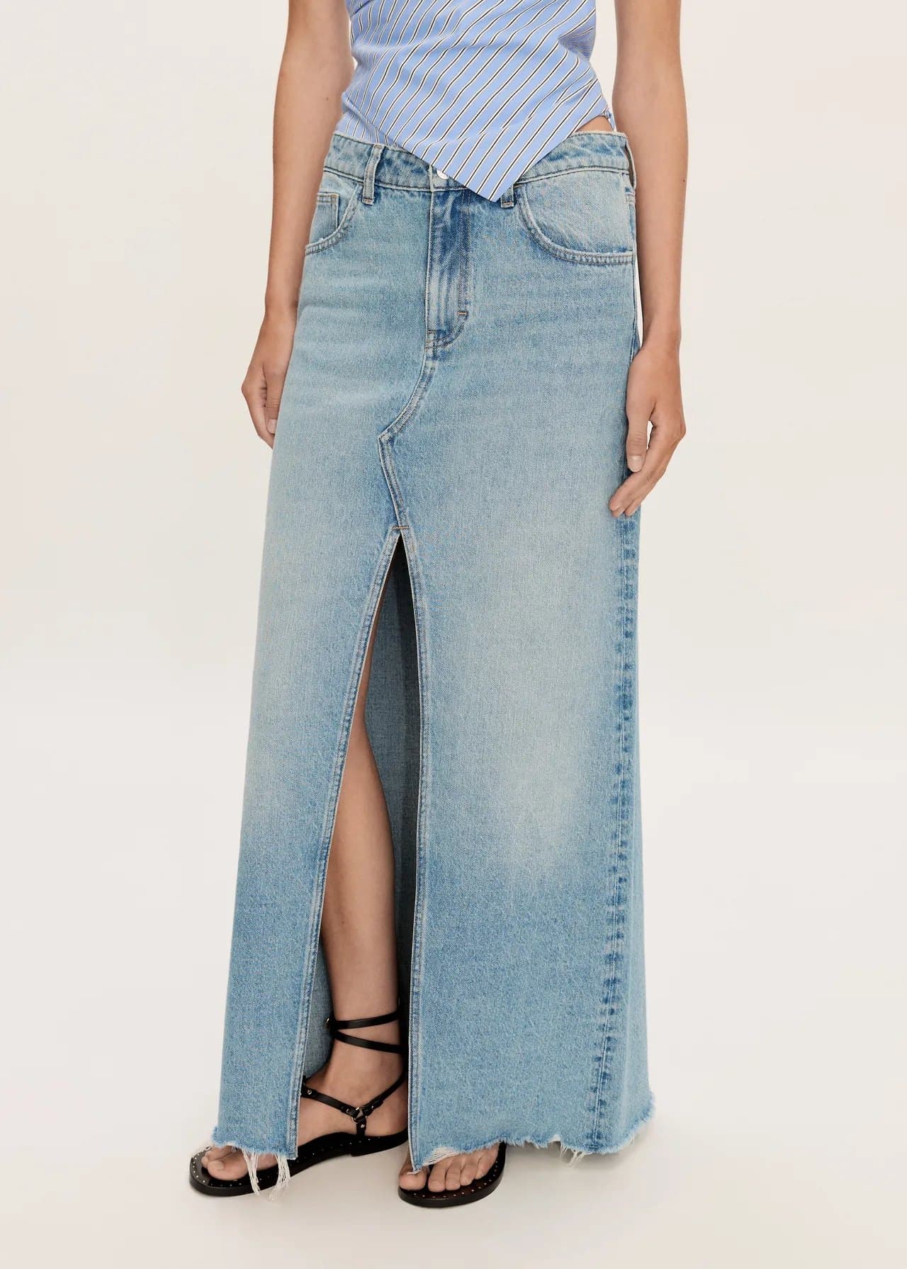 Light-wash denim maxi skirt with a front slit