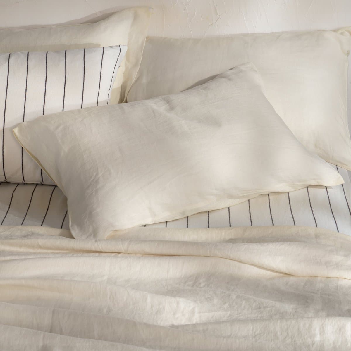 A pinstripe cotton pillowcase