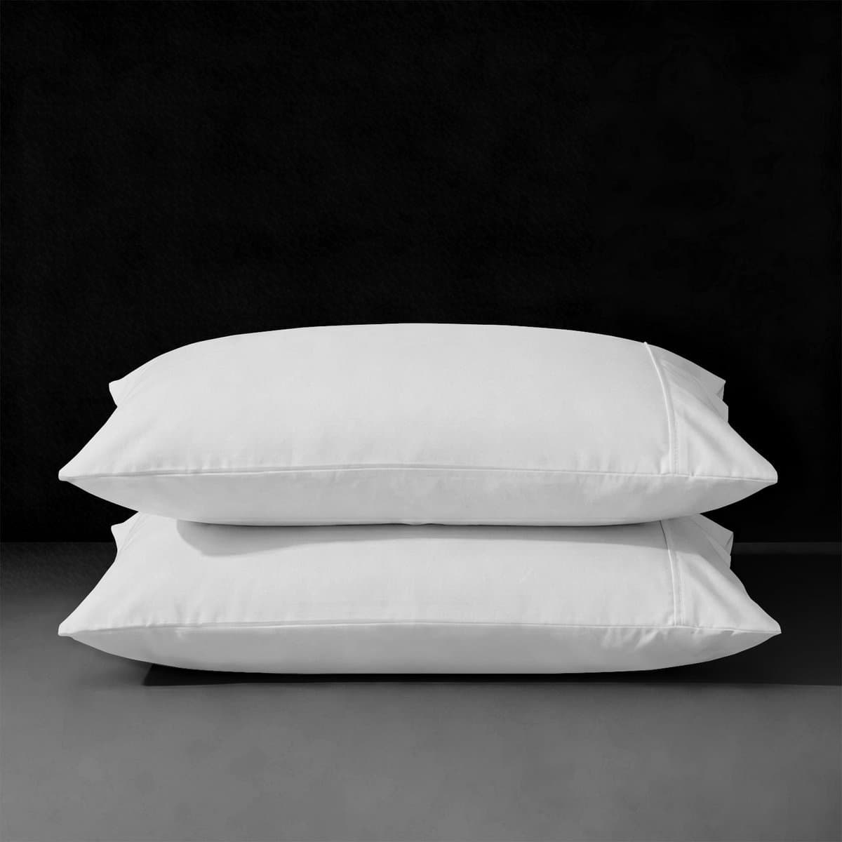 A white envelope-closure pillowcase