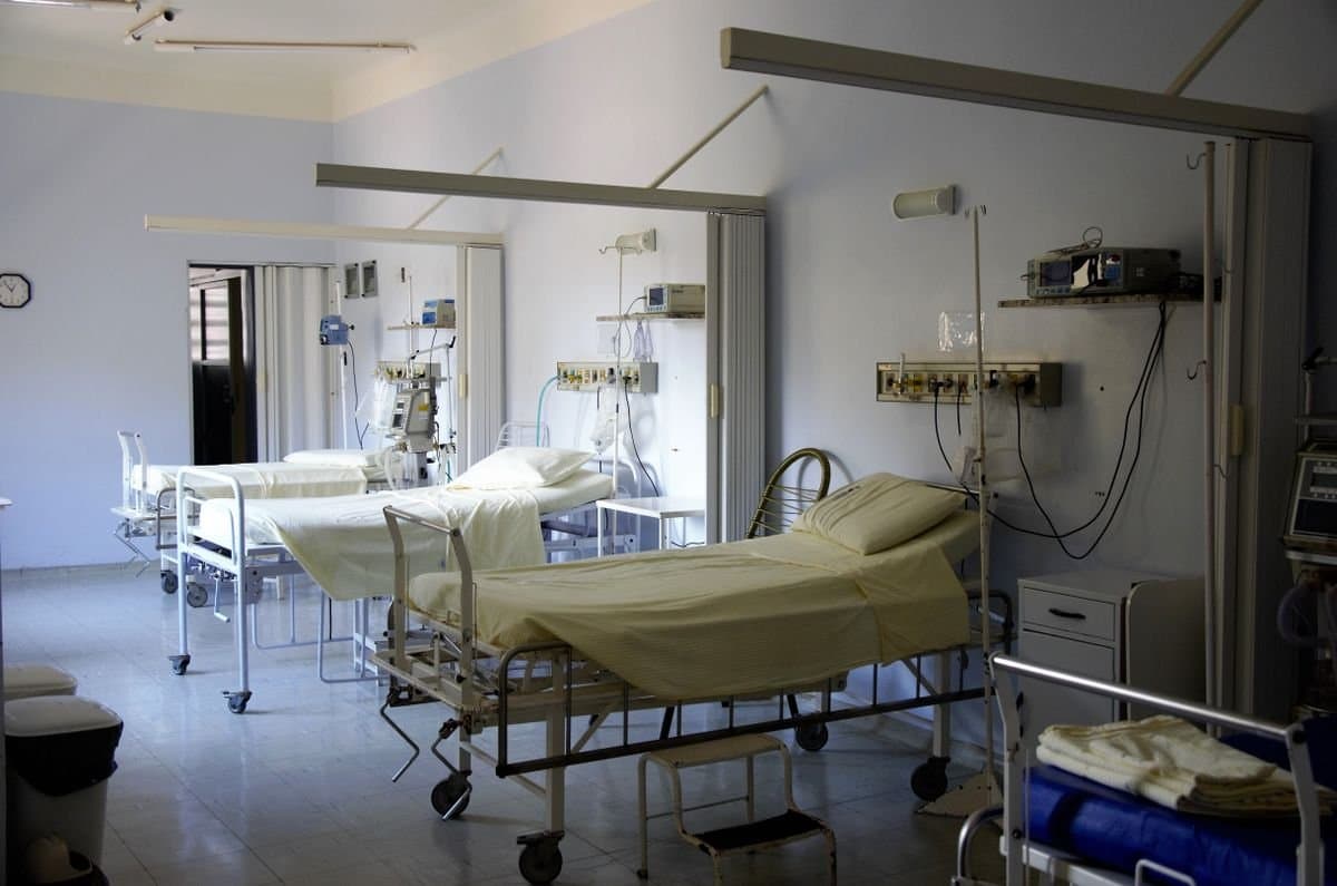 Critical care beds dressed in white linen