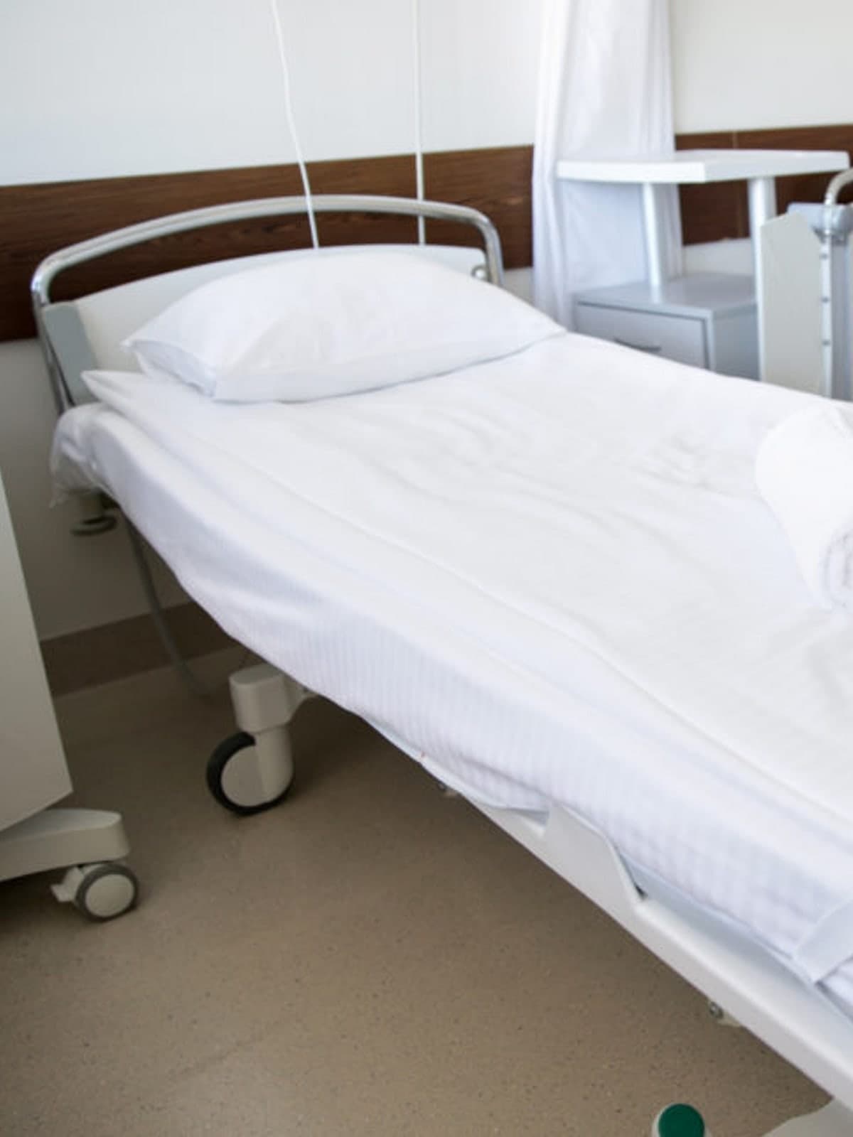 A bed made up in fresh white linen