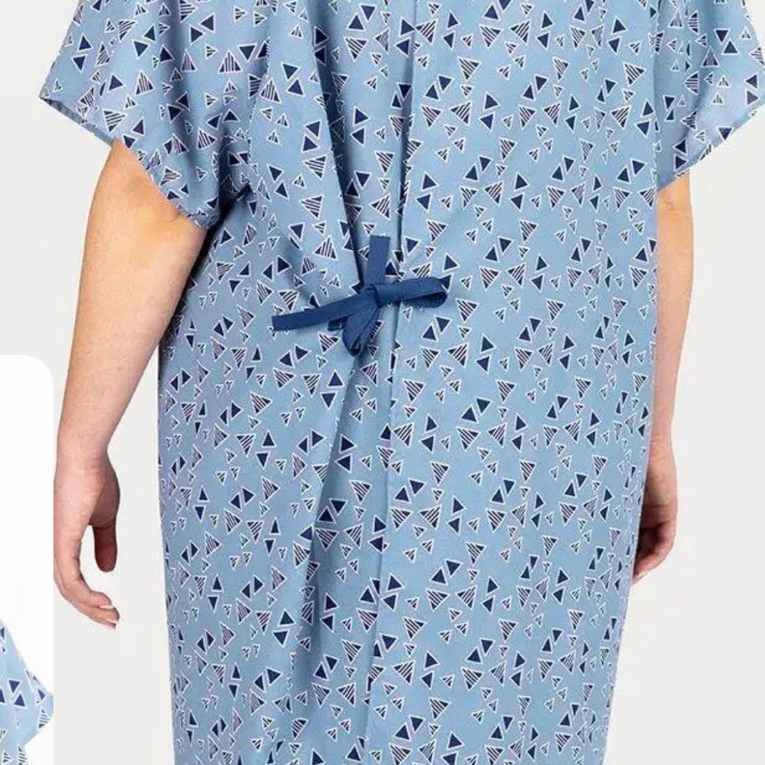 A printed blue patient gown, back view