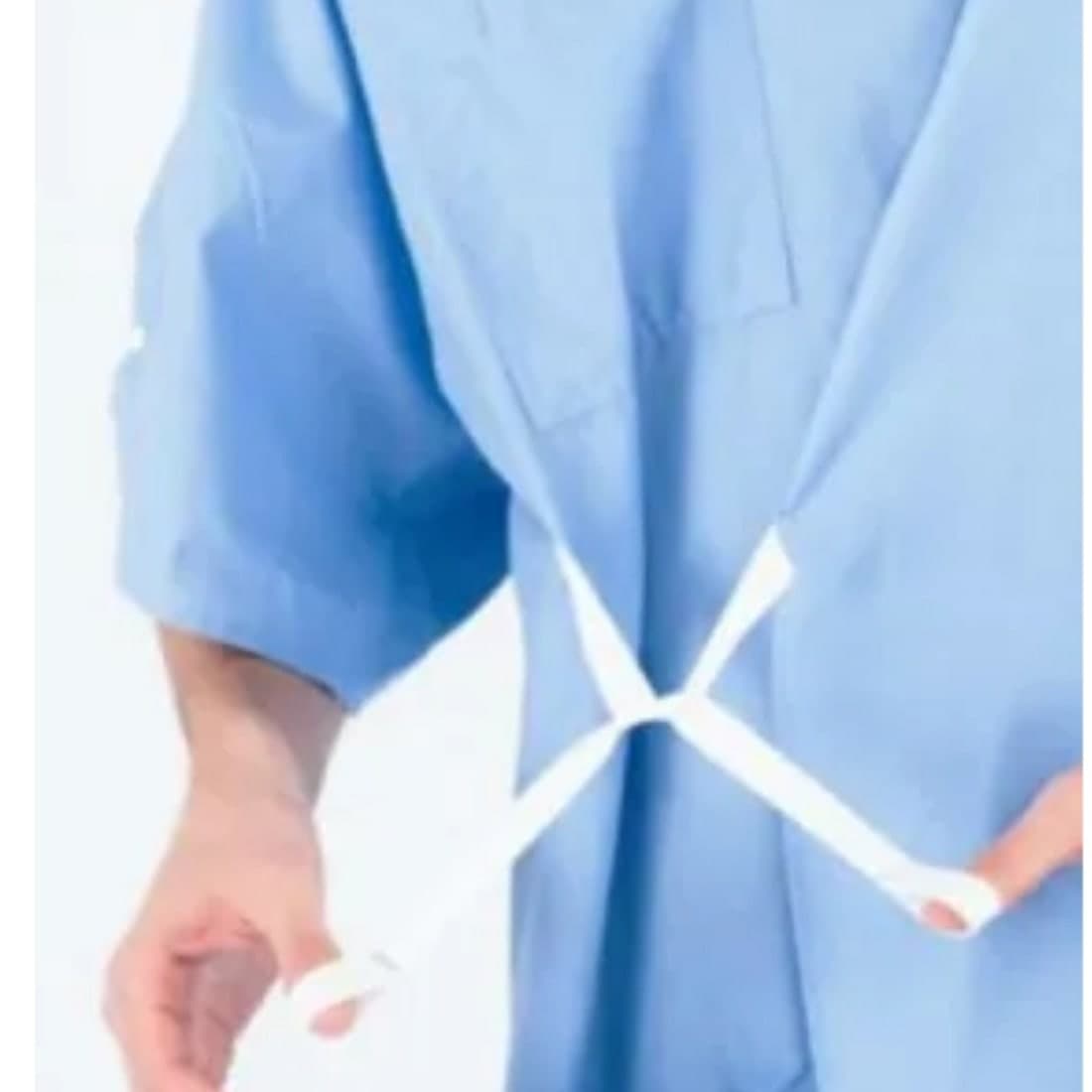 A blue patient gown with back ties