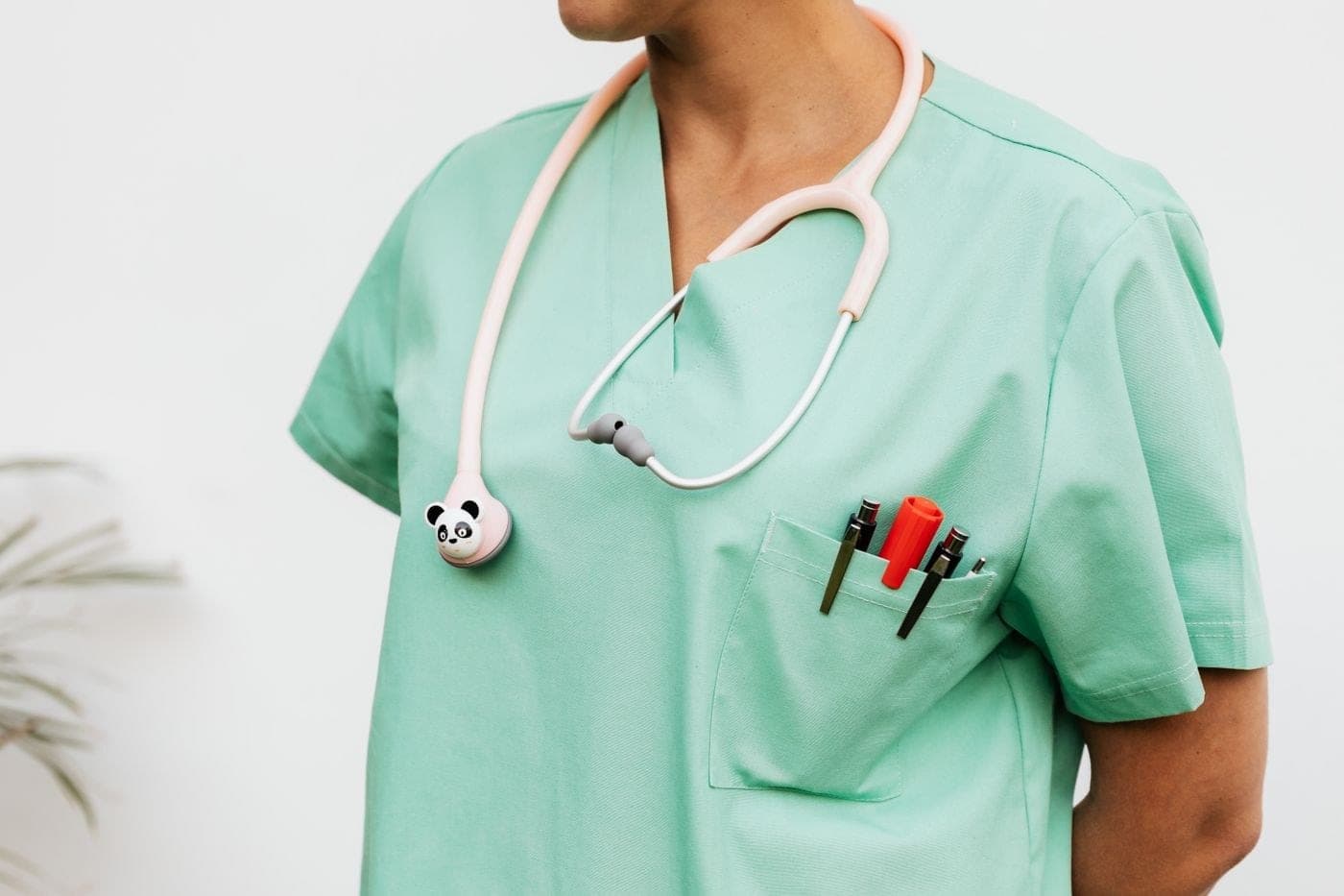 Green scrubs with a stethoscope