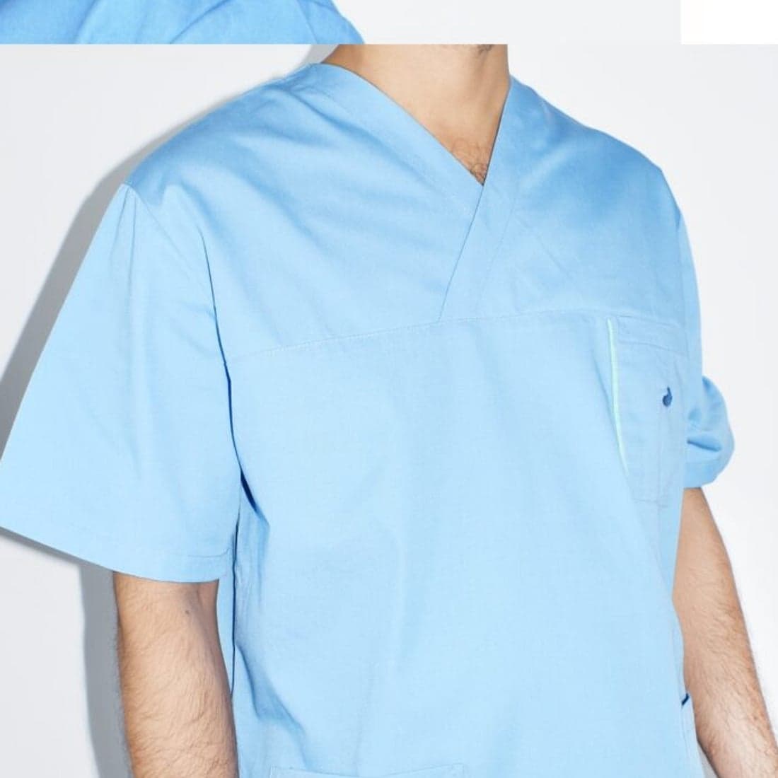 A blue medical scrub top