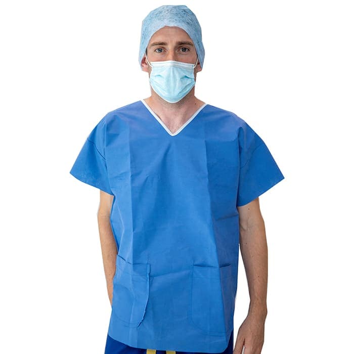 A blue theatre scrub tunic worn by a clinician