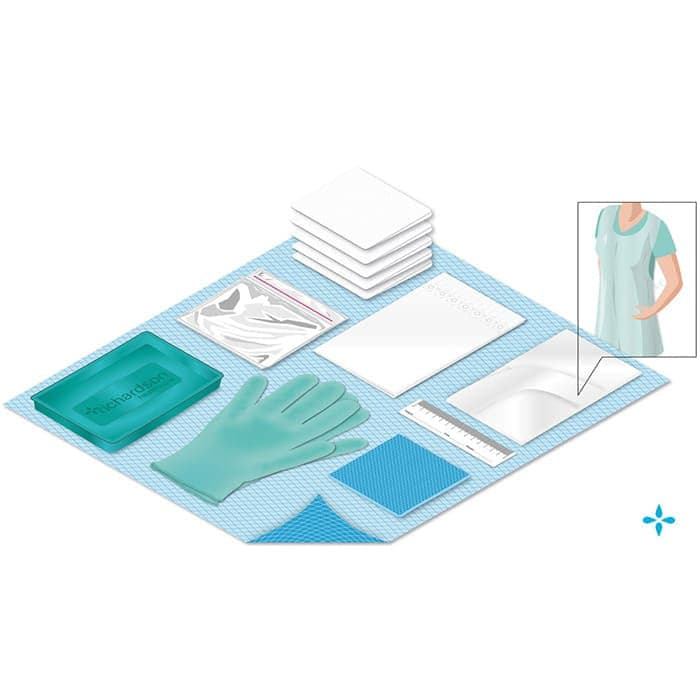 A sterile surgical drape and dressing pack laid out