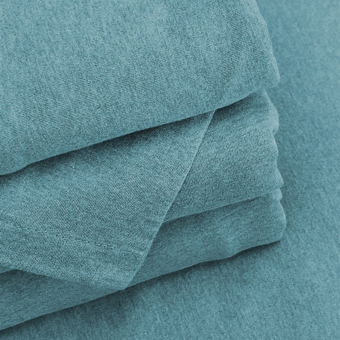 Folded sage-teal surgical drape fabric