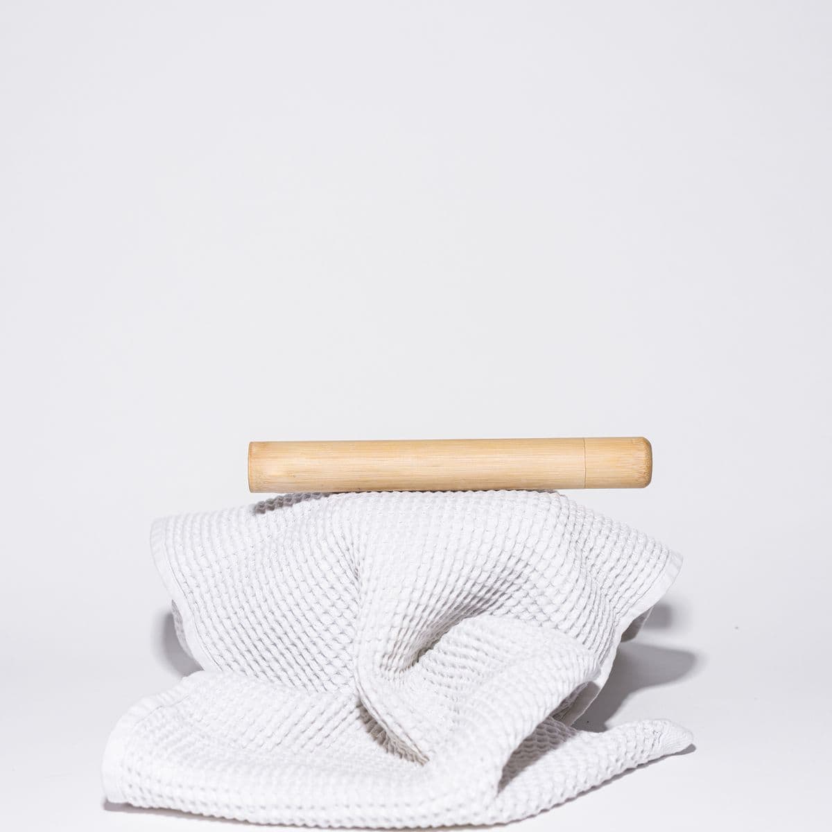 A white waffle-weave towel