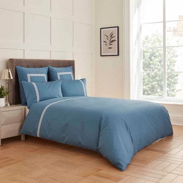 Midnight teal duvet set with white Celtic knot embroidery