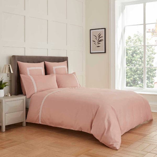 Rose pink duvet set with white Celtic knot embroidery