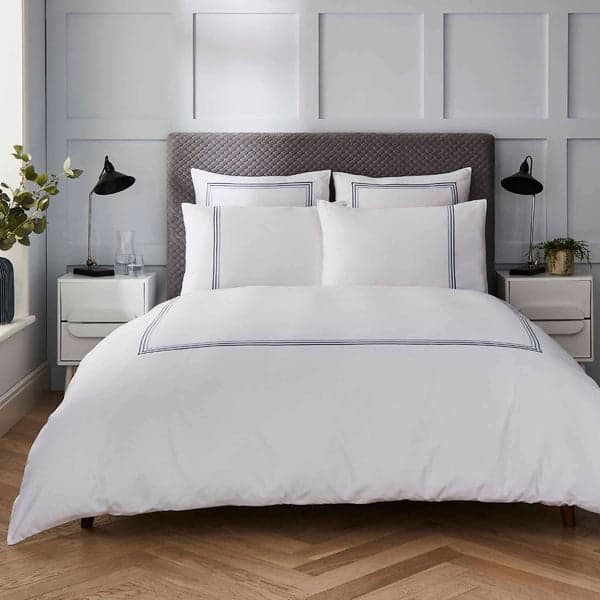 White duvet set with navy triple row cord embroidery