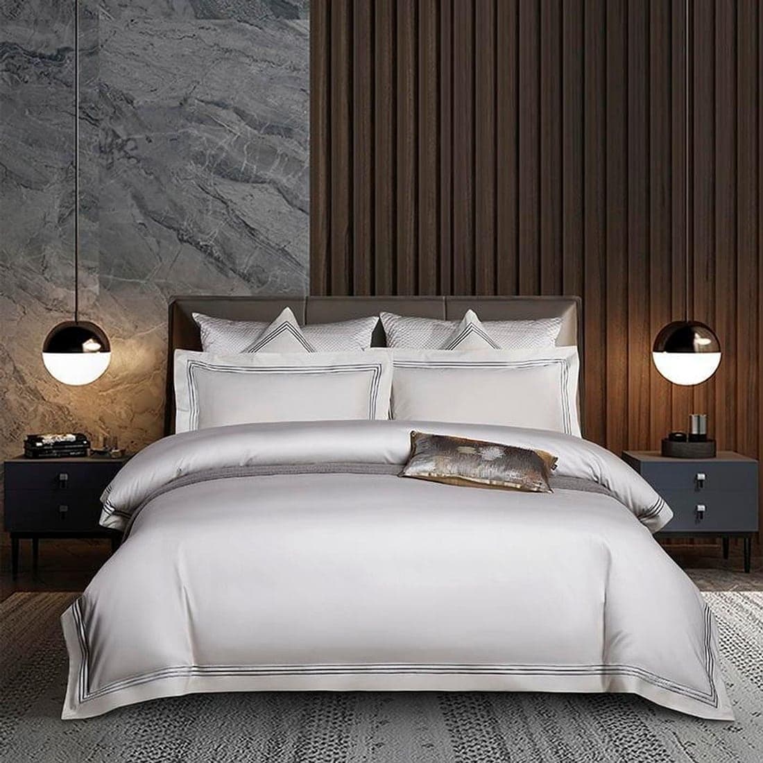 Warm white cotton folds on a made-up bed