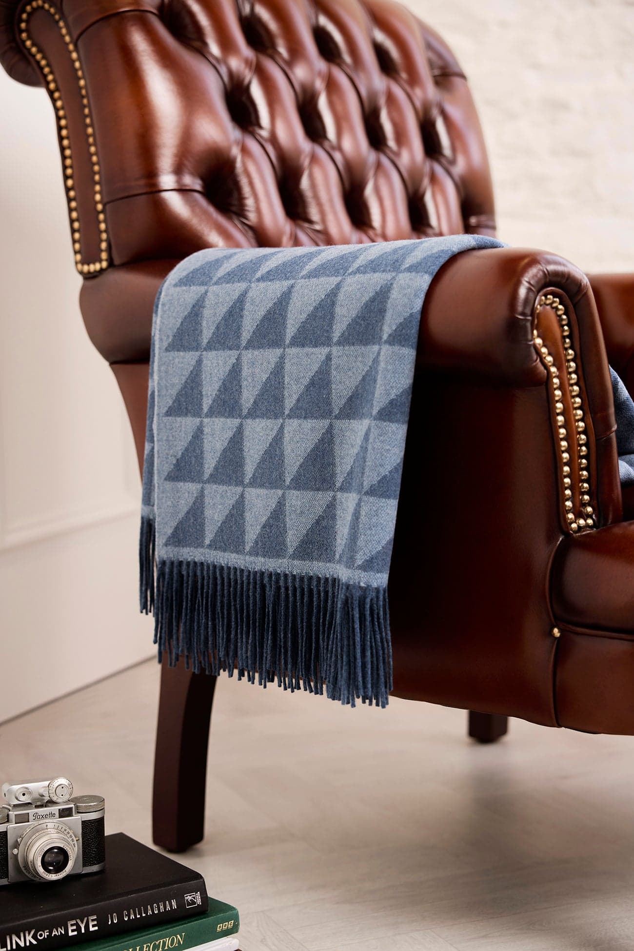 Natural oat cashmere blanket, neatly folded