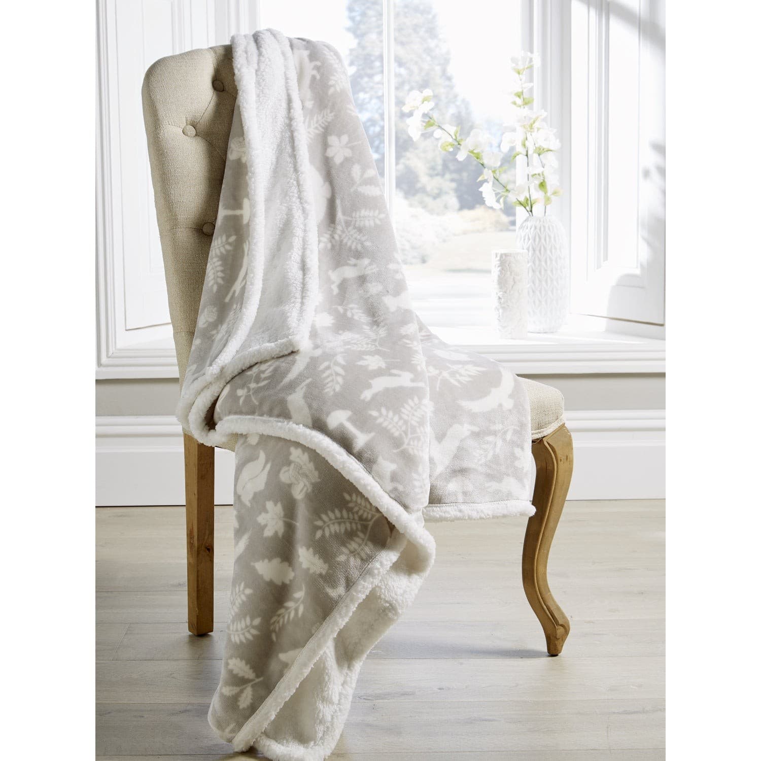 Grey and white woodland patterned sherpa throw