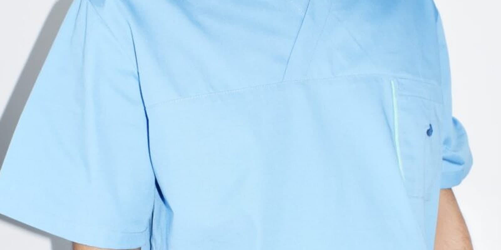A blue medical scrub top
