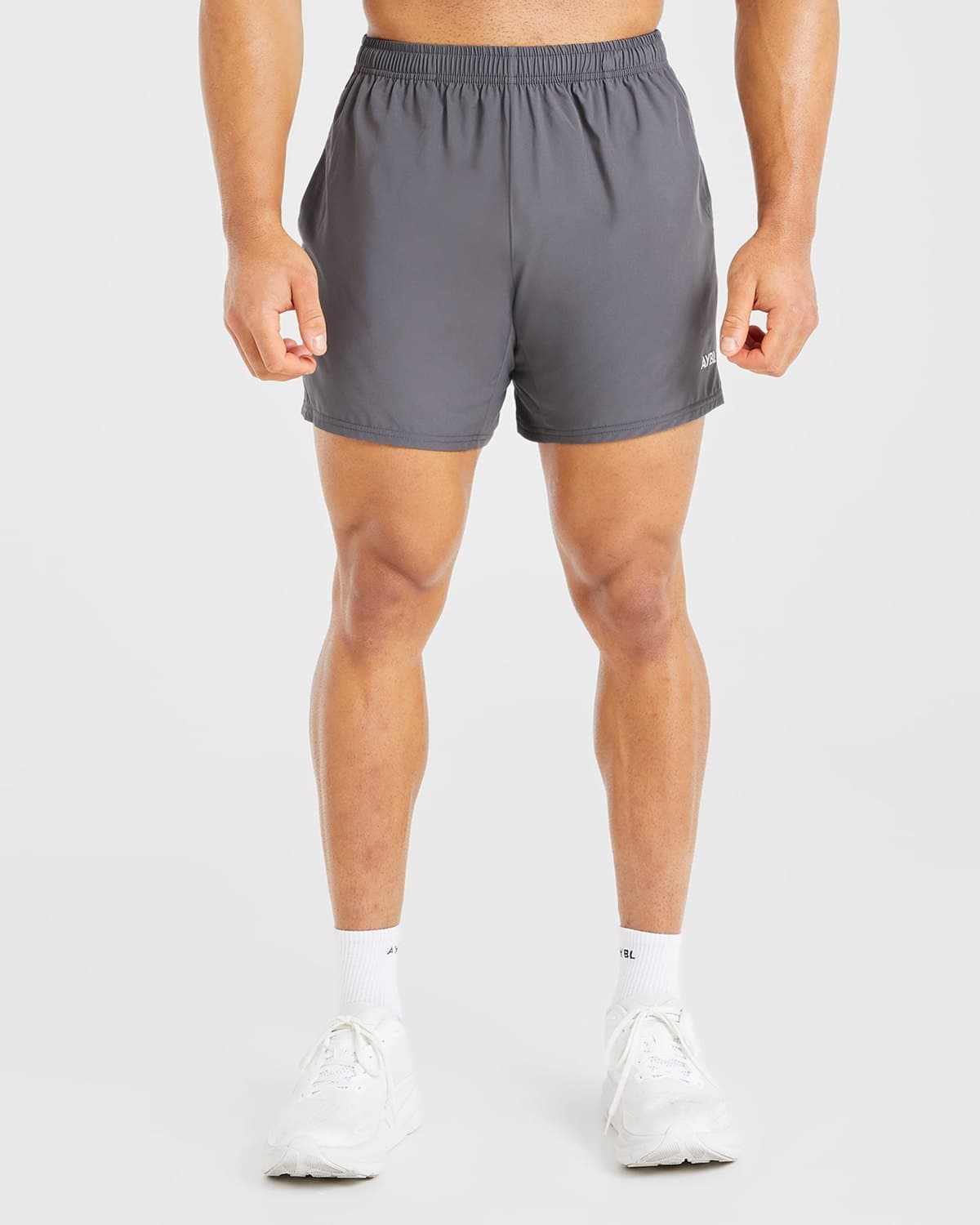 Male model in charcoal Core training shorts