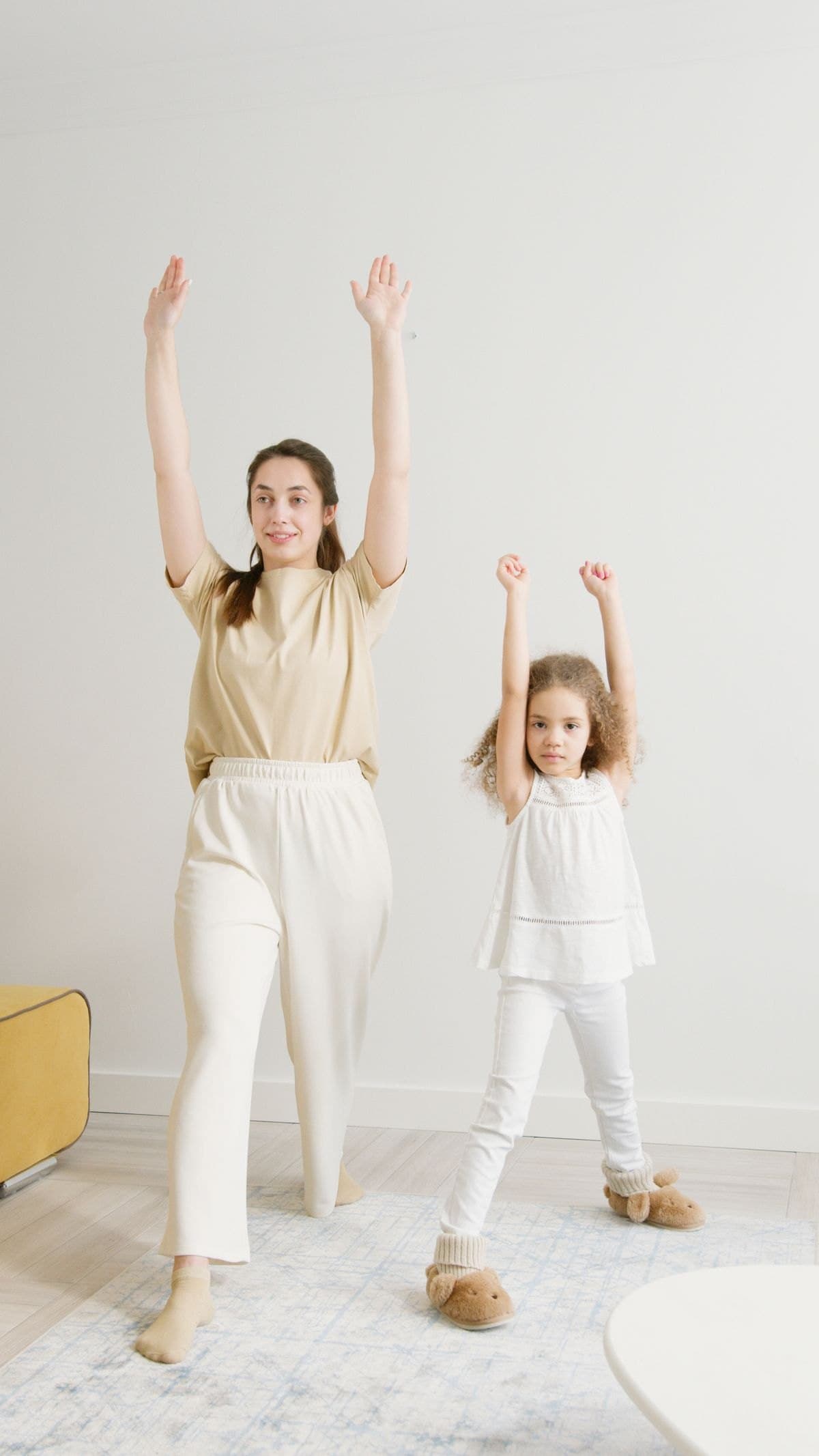 Woman in printed leggings doing yoga in soft daylight