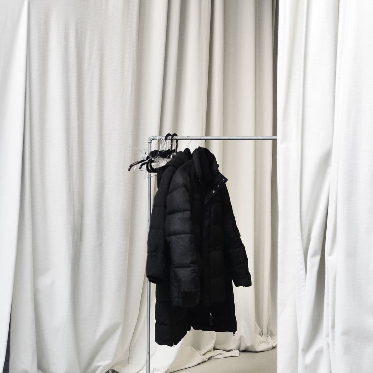 A black padded puffer jacket