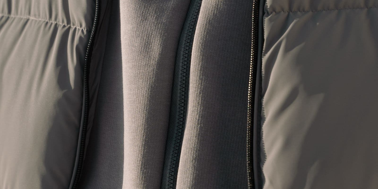 A padded puffer and fleece base-layer with open zips