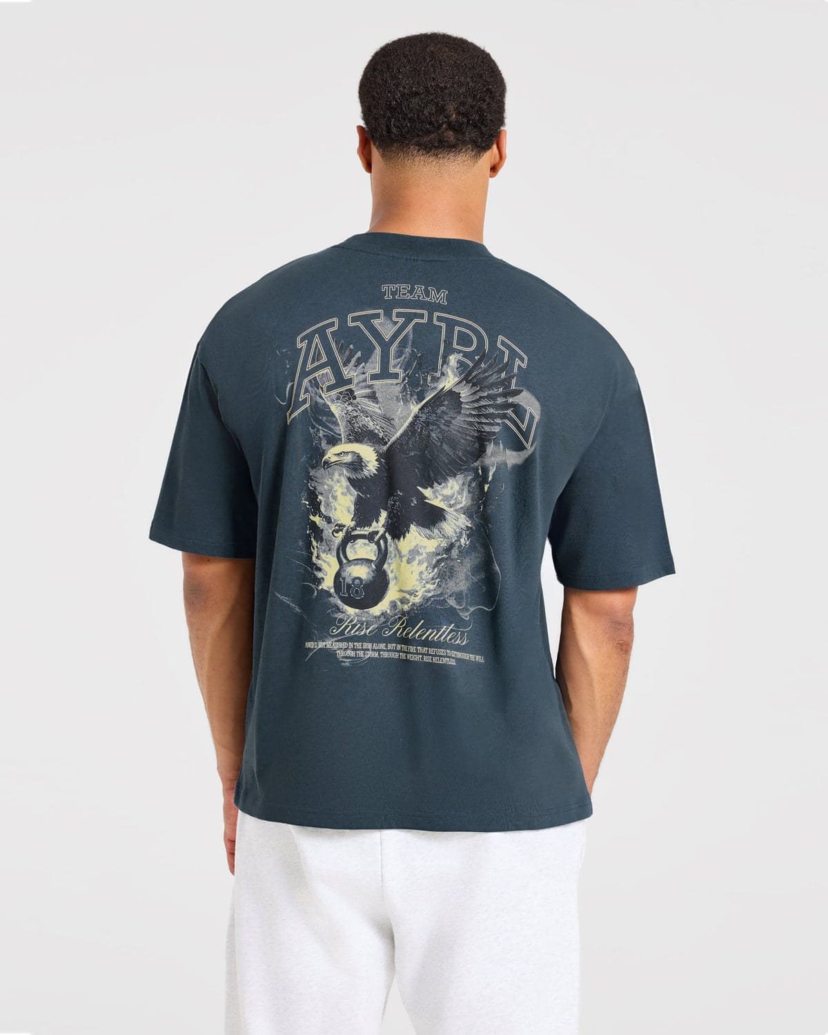 Petrol blue oversized performance tee on model