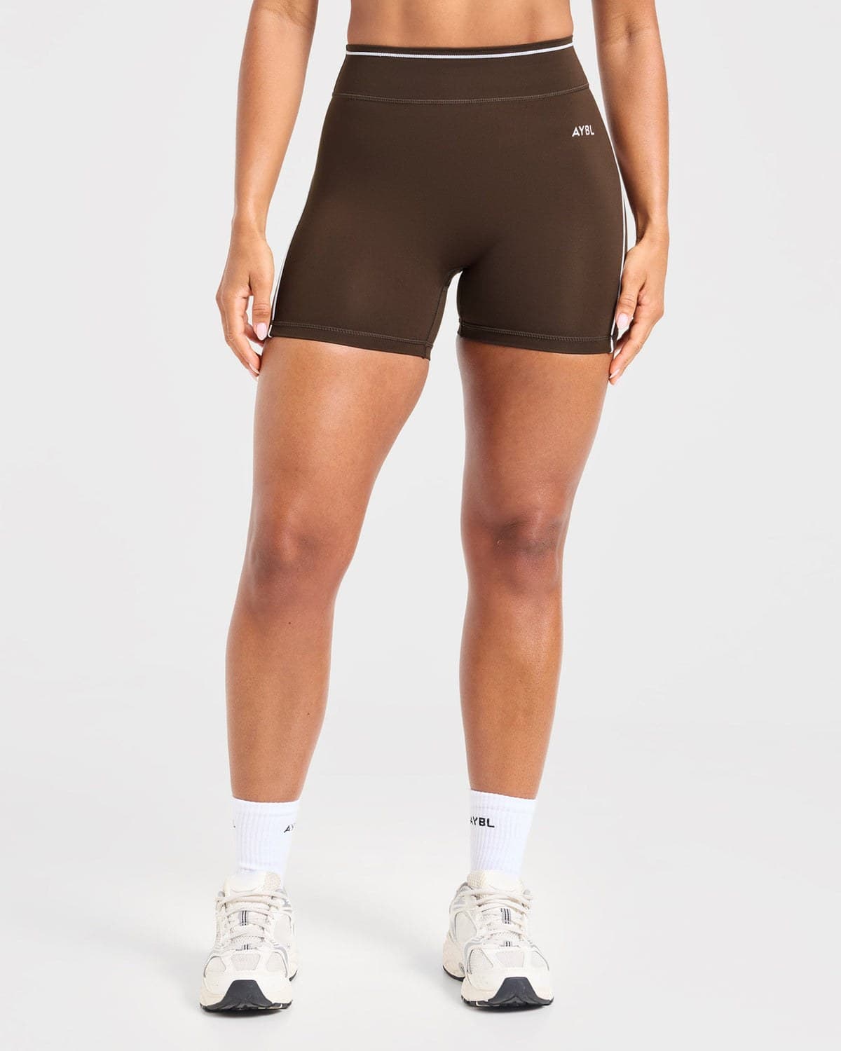 Coffee-bean training shorts on model