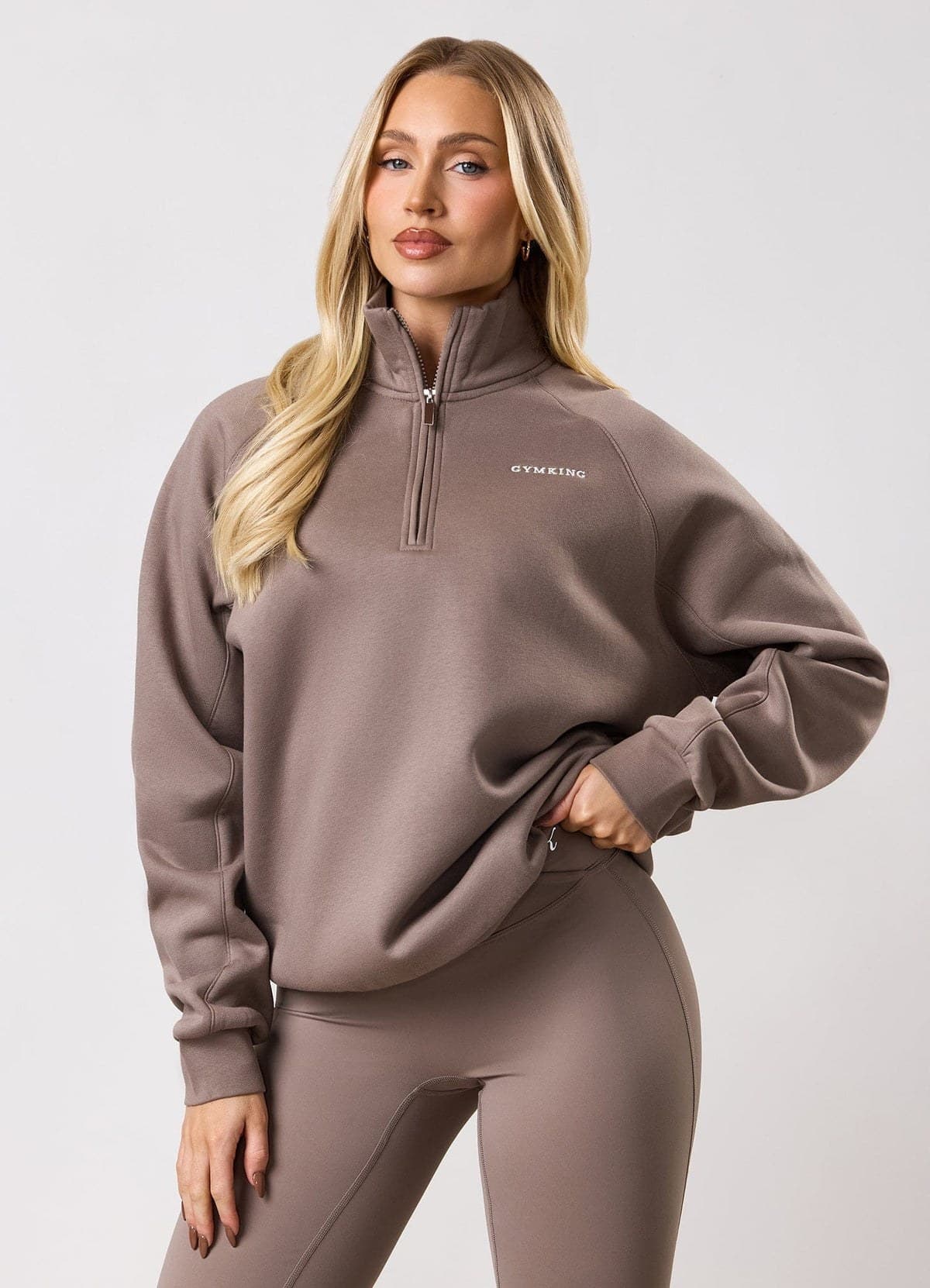 Truffle raglan fleece quarter-zip funnel on model