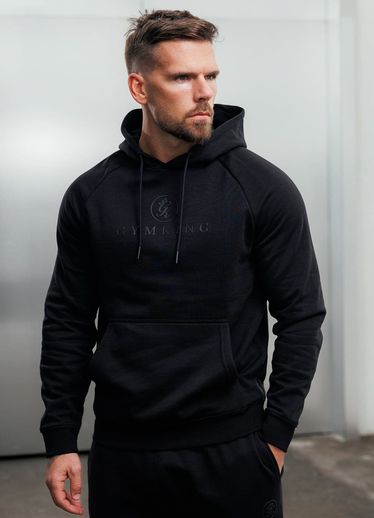 Black pro training hoodie on model