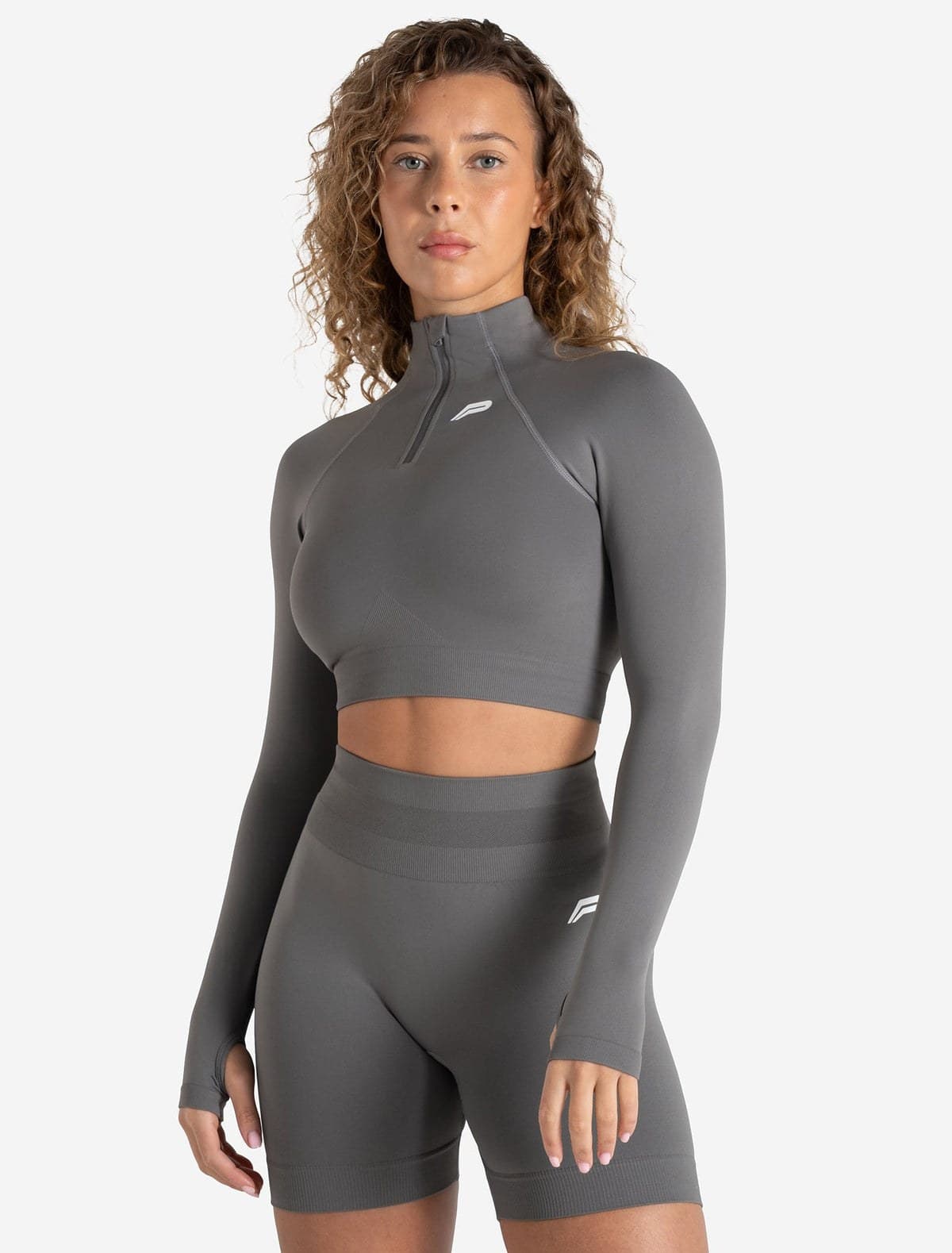 Mid grey seamless half-zip training crop on model