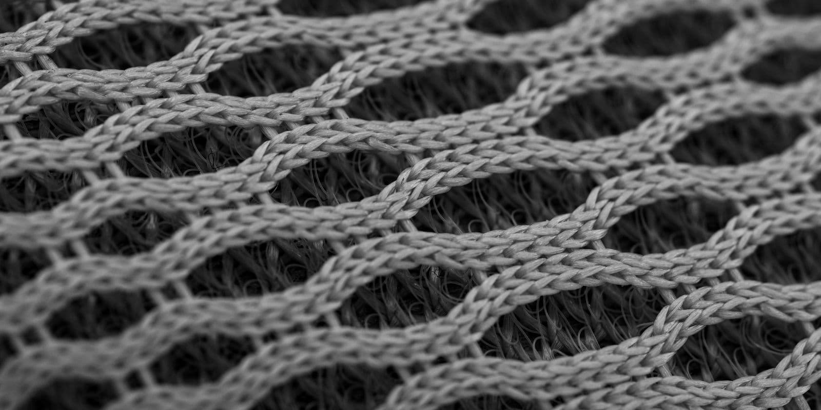 Grey honeycomb performance mesh fabric