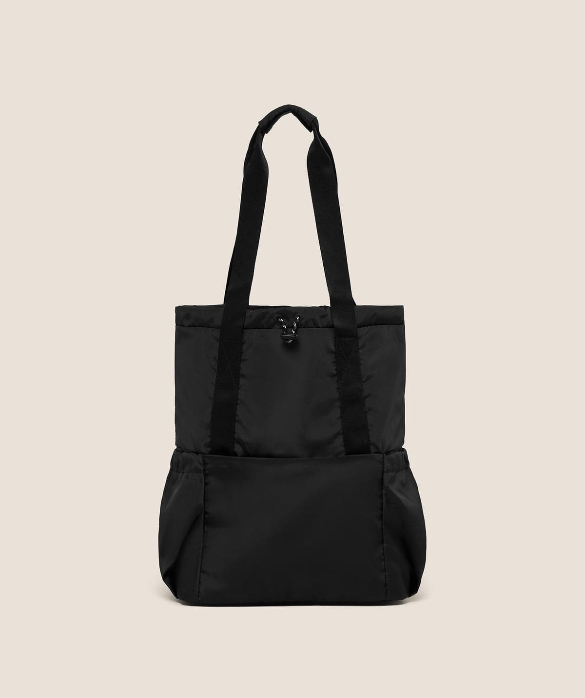 A black lightweight drawstring tote bag
